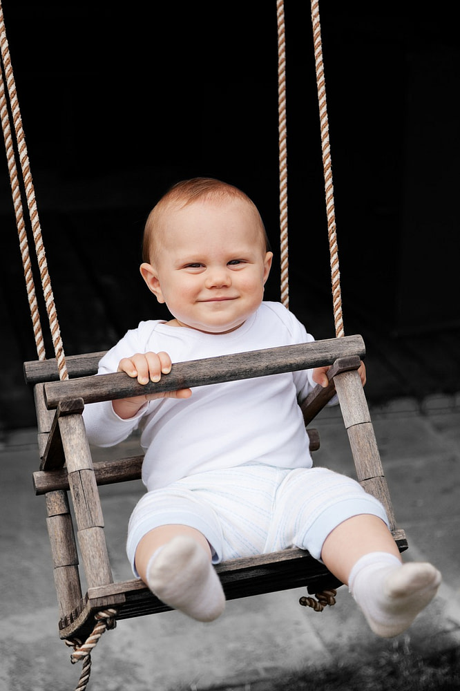Baby in a swing
